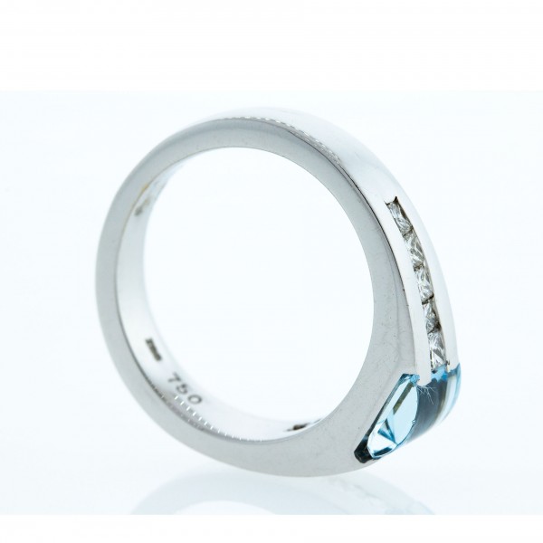 Blue Topaz and Diamond Ring (.50ctw)