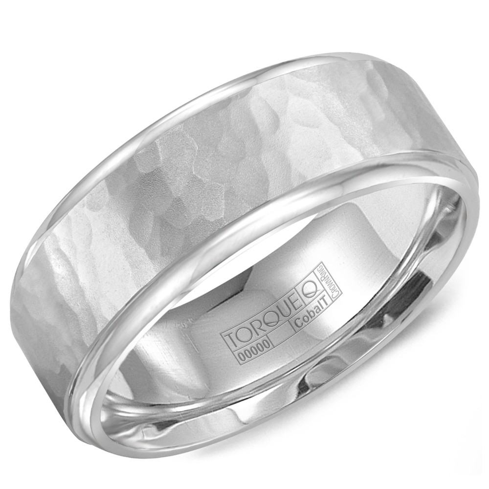 A White Cobalt Torque Band With A Hammered Center And Polished Edges.