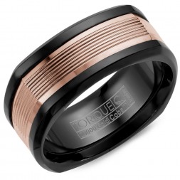 A Black Cobalt Torque Band With A Rose Gold Inlay Featuring Carved Line Detailing.