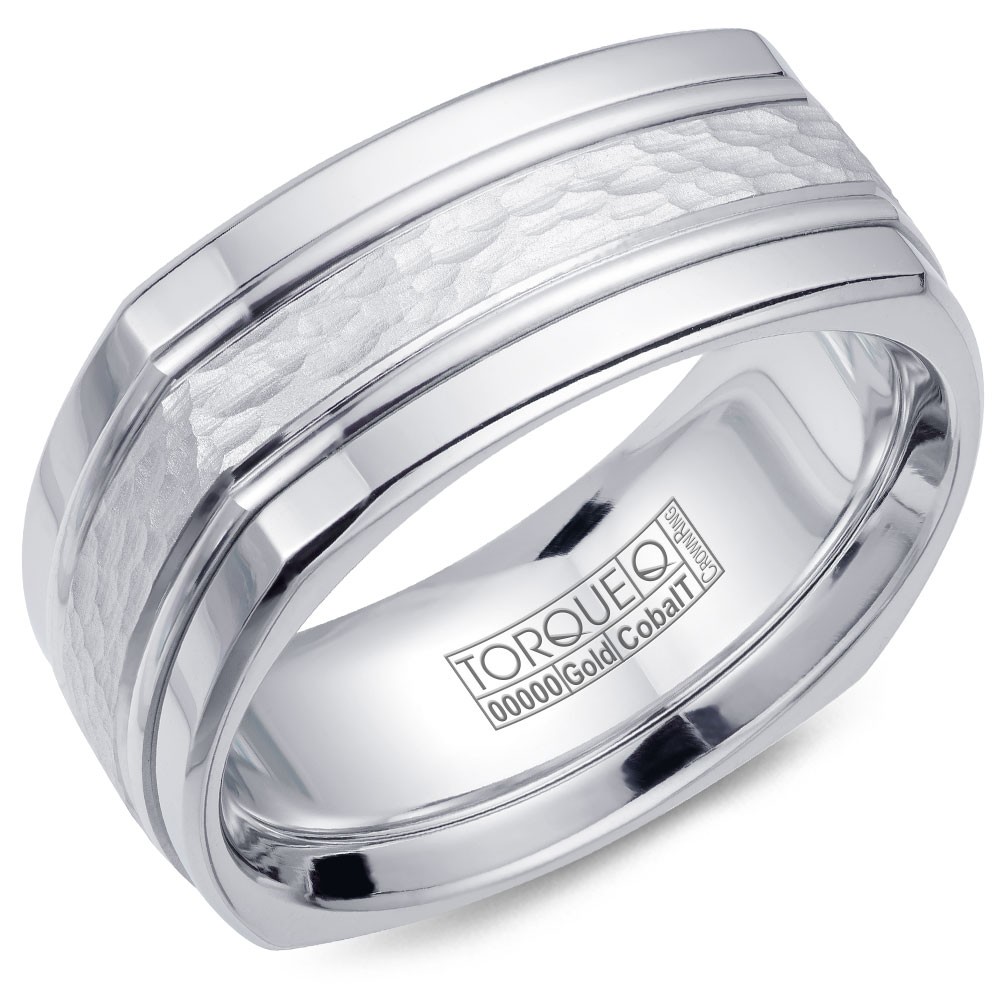 A Torque Ring In White Cobalt With A Hammered White Gold Center And Line Detailing.