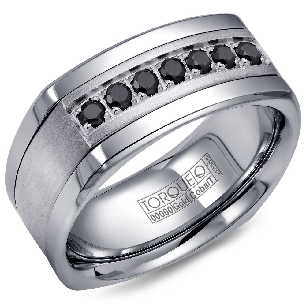 A Torque Ring In White Cobalt With A White Gold Inlay And Seven Black Sapphires.