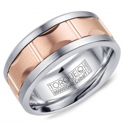 A Torque Ring In White Cobalt With A Carved Rose Gold Center.