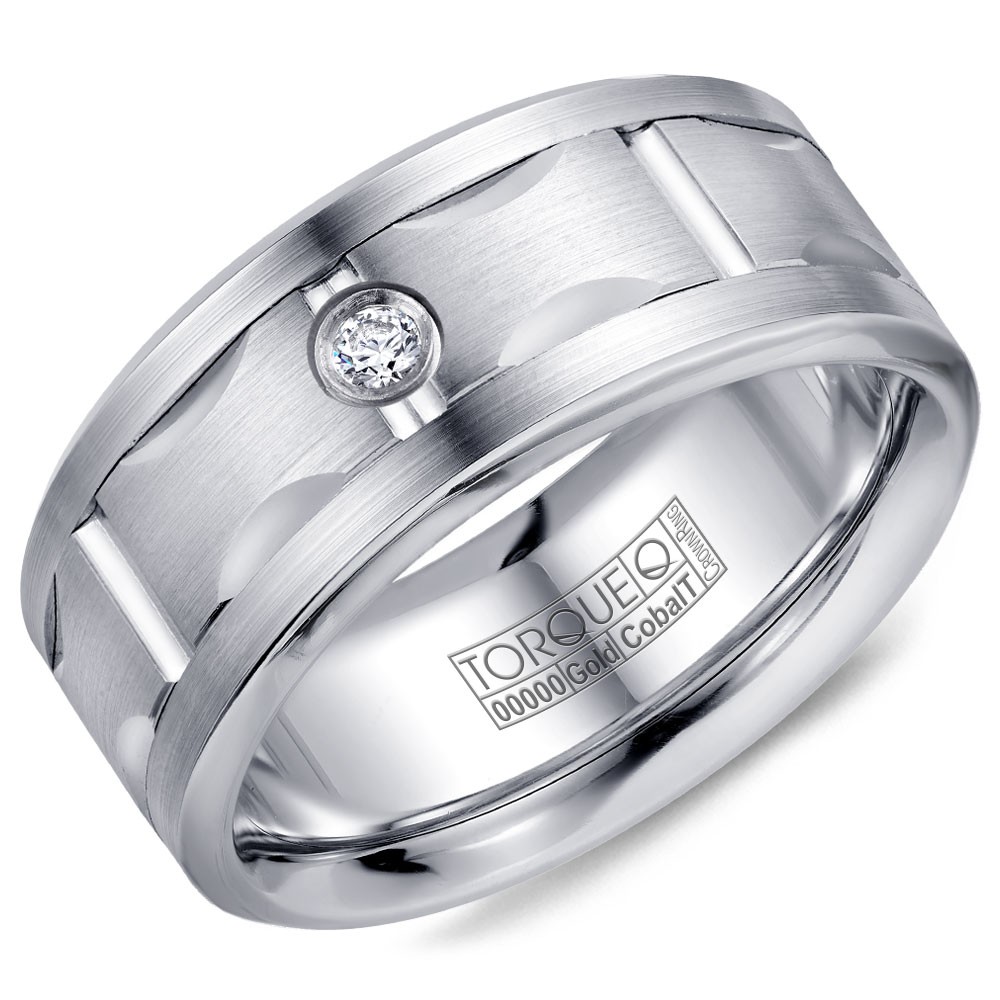 A Torque Ring In White Cobalt With A Carved White Gold Center And A Diamond.