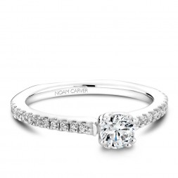 A Carver Studio white gold engagement ring with 23 diamonds.