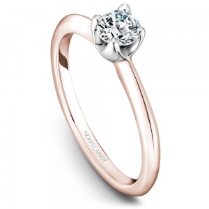 A floral Carver Studio rose and white gold engagement ring with a round center stone.