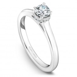 A solitaire Carver Studio white gold engagement ring with 15 diamonds.