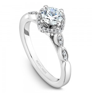 A floral Carver Studio white gold engagement ring with 29 diamonds.