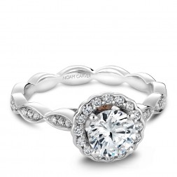 A Carver Studio white gold engagement ring with a floral halo and 35 diamonds.