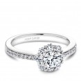 A floral Carver Studio white gold engagement ring with 25 diamonds.
