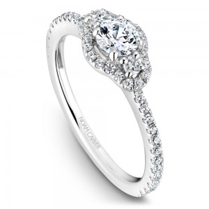 A 3-stone Carver Studio white gold engagement ring with 47 diamonds.