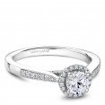 A floral Carver Studio white gold engagement ring with 45 diamonds.