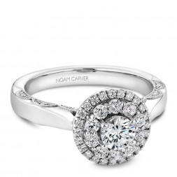 A floral Carver Studio white gold engagement ring with 47 diamonds.