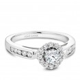A vintage Carver Studio white gold engagement ring with 25 diamonds.