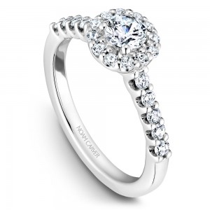 A Carver Studio white gold engagement ring with a halo and 23 diamonds.