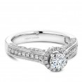 A vintage Carver Studio white gold engagement ring with 61 diamonds.