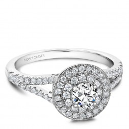 A Carver Studio white gold engagement ring with a double halo and 63 diamonds.