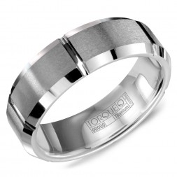 A Tungsten Torque Band With Carved Detailing.